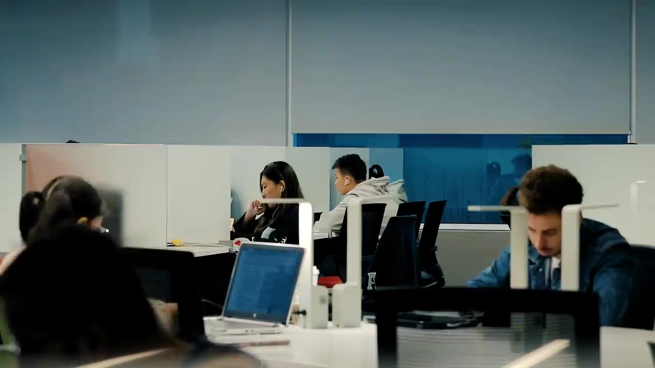 Short clips of small teams at work, paperwork, dashboards, and warehouse and logistics operations